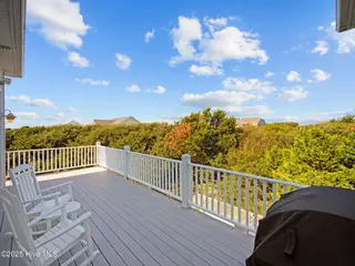 6414 Ocean Drive, Emerald Isle, NC 28594 – photo 18: Deck off kitchen overlooking pool