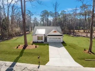 403 Justice Flynn Road, Riegelwood, NC 28456 – photo 2: 2-web-or-mls-DJI_20260210123822_0058_D_1