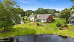 3010 Remington Drive, Wilmington, NC 28405 — 2-bedroom waterfront townhome in Northchase, Wilmington, NC, photo 22 of 42: 25_dji_20260727105440_0048_d