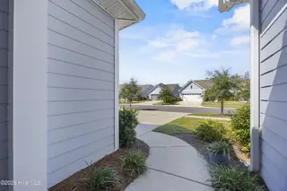 3205 Laughing Gull Terrace, Wilmington, NC 28412 — 2-bedroom home in Riverlights - Del Webb, Wilmington, NC, photo 16 of 60: 5_frontyard