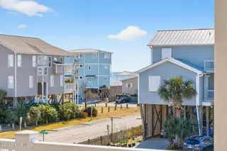 3228 E Dolphin Drive, Oak Island, NC 28465 – photo 20: KahunaPhoto.com-76