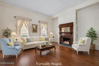 301 E Moore Street, Southport, NC 28461 – photo 14: Virtually staged living room elegance