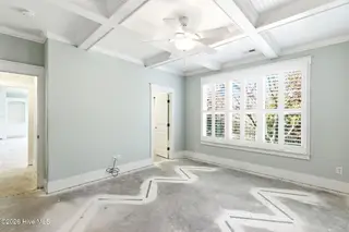 1454 Dunes Boulevard SW, Ocean Isle Beach, NC 28469 – photo 17: Coffer ceiling/large windows