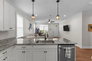162 NW 9th Street, Oak Island, NC 28465 – photo 13: open kitchen living rm