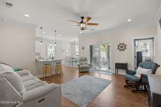 129 NW 11th Street, Oak Island, NC 28465 – photo 5: living-dining-kitchen