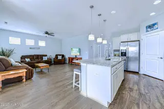 520 Slippery Rock Way, Calabash, NC 28467 — 3-bedroom home in The Farm, Calabash, NC, photo 8 of 33: Kitchen/Living Room
