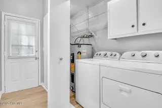 127 NW 19th Street, Oak Island, NC 28465 – photo 12: Laundry closet