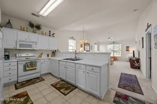 916 Great Egret Circle SW # 3, Sunset Beach, NC 28468 – photo 6: 34-web-or-mls-IMG_2311