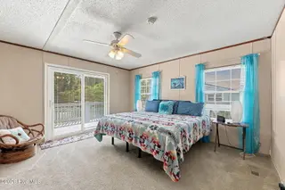 238 Lucille Lewis Drive, Marshallberg, NC 28553 – photo 13: Primary Bedroom