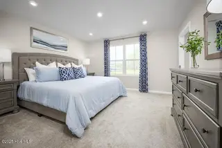 8081 Sterling Oaks Drive NW, Ash, NC 28420 – photo 20: Rosewood Owner Suite