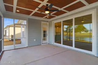 111 Windswept Lane, Beaufort, NC 28516 – photo 17: Screened Porch Overlooking Golf Course