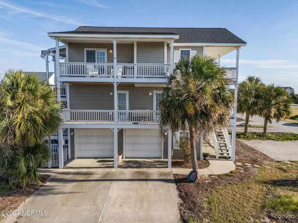 122 Quinton Street, Holden Beach, NC 28462 — 3-bedroom home in Holden Beach, Holden Beach, NC, photo 1 of 54: 48-web-or-mls-DJI_20240904175115_0426_D