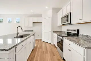 4329 Coralbead Lane Lot 97, Leland, NC 28451 — 5-bedroom home in Grayson Park, Leland, NC, photo 8 of 45: Kitchen