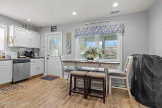 3111 Arendell Street, Morehead City, NC 28557 – photo 17: Dining overlooks backyard and porch