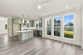 52 Pier View Court, Hampstead, NC 28443 — 3-bedroom waterfront home, Hampstead, NC, photo 24 of 60: 34_hallway, kitchen & living area