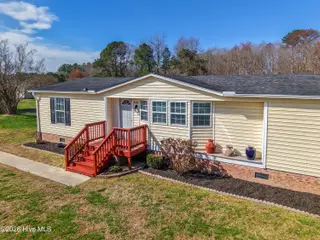 504 Timothy Drive, Elizabeth City, NC 27909 — 3-bedroom manufactured home in Timothy Acres, Elizabeth City, NC, photo 5 of 47: DJI_20260310111911_0245_Dedit