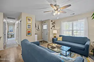111 NW 10th Street, Oak Island, NC 28465 – photo 11: 22 living room