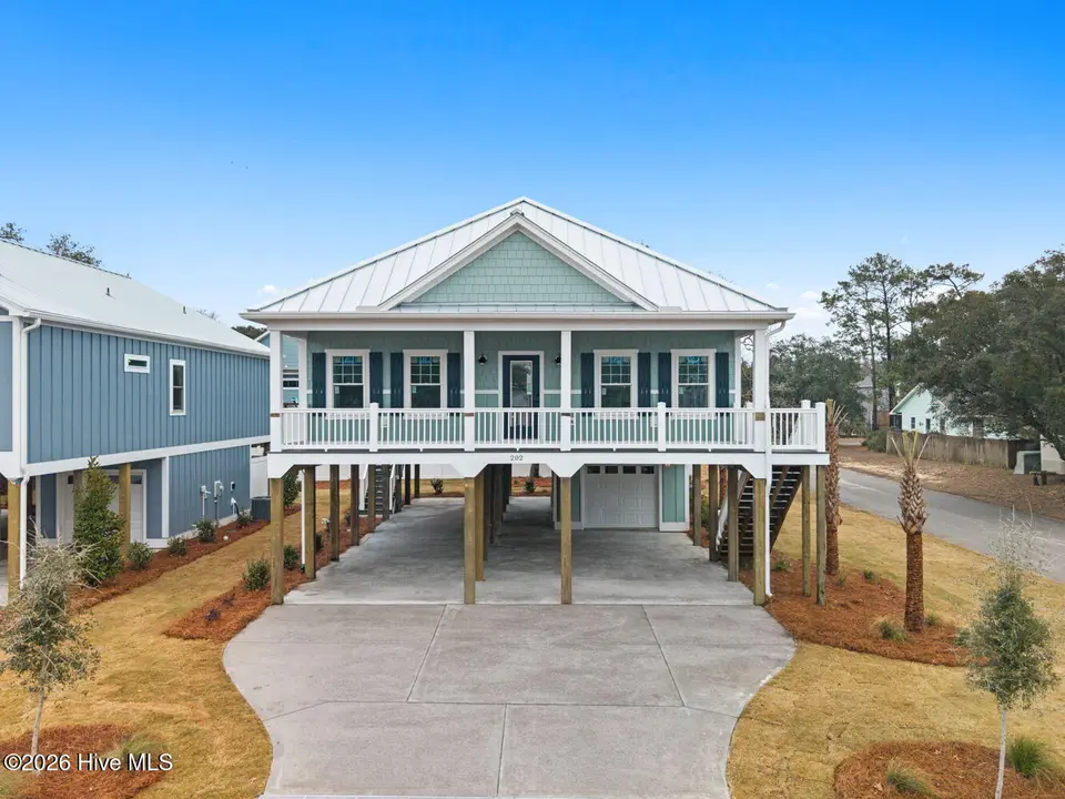 202 NE 33rd Street, Oak Island, NC 28465 – photo 1 of 51: 1-web-or-mls-Cammediallc.com- (2)