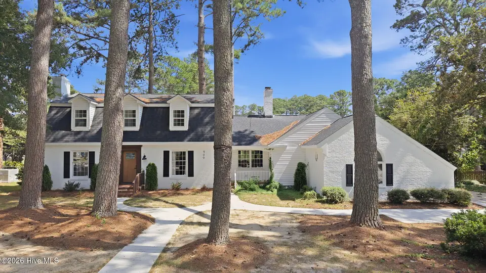 909 Parkside Drive NW, Wilson, NC 27896 – photo 1 of 62: 3-web-or-mls-DJI_20260818145743_0090_D