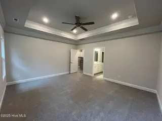 1222 Mandevilla Drive SE, Bolivia, NC 28422 – photo 22: Primary Suite