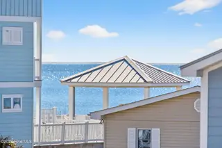 3228 E Dolphin Drive, Oak Island, NC 28465 – photo 21: KahunaPhoto.com-74