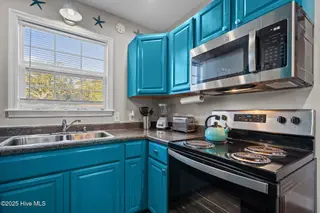 114 NE 50th Street, Oak Island, NC 28465 – photo 18: 53-web-or-mls-DSC04181