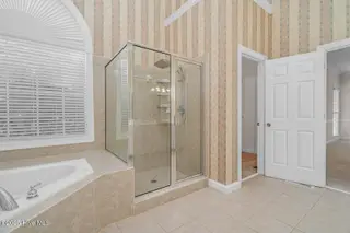 1119 Falling River Walk, Rocky Mount, NC 27804 — 4-bedroom home in River Falls, Rocky Mount, NC, photo 24 of 51: Separate shower + Dual Closets