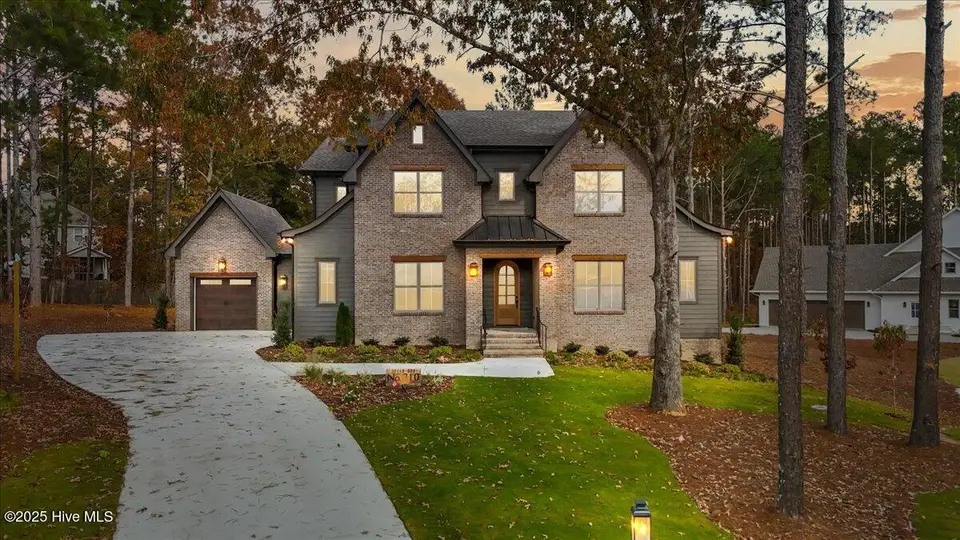 310 Sloan Lane, Pinehurst, NC 28374 – photo 1 of 54: 01-dji_fly_20240218_080210_0322_17626582