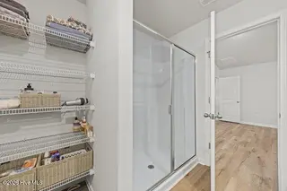 238 Poppleton Drive, Hampstead, NC 28443 – photo 17: m_17_bathroom