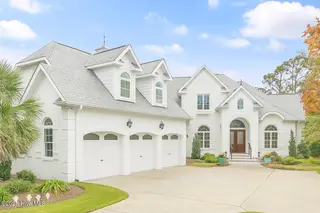 3121 Moss Hammock Wynd, Southport, NC 28461 – photo 2: Mediterranean Home in Suburban Serenity
