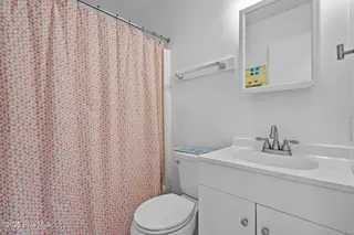 2906 E Dolphin Drive, Oak Island, NC 28465 – photo 24: 30-web-or-mls-DSC08848