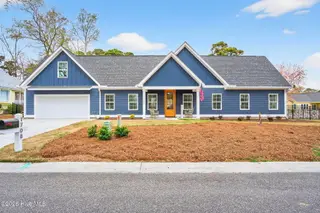 1708 Oakbrook Drive SW, Ocean Isle Beach, NC 28469 – photo 1: Stunning at 1708 Oakbrook Dr