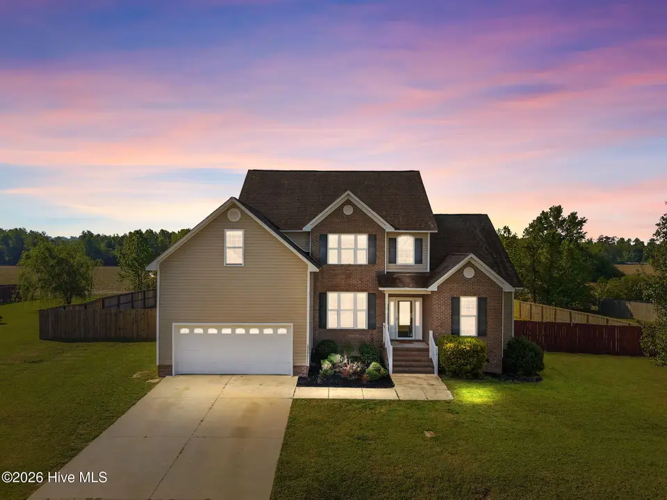 118 Farmington Drive, Richlands, NC 28574 – photo 1 of 63: Twlight Front