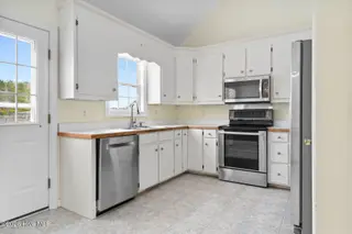 6574 Leigh Road, Rocky Mount, NC 27803 — 3-bedroom home in Williams Farm, Rocky Mount, NC, photo 15 of 30: Eat-In Kitchen