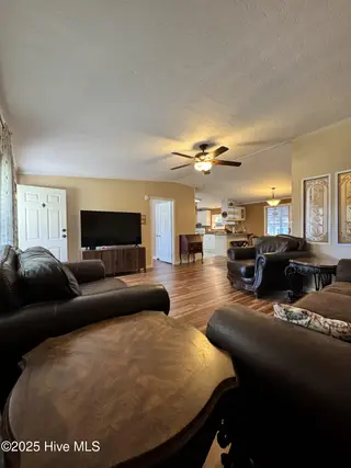 211 Beachwood Drive NW, Calabash, NC 28467 — 3-bedroom manufactured home in Ocean Forest, Calabash, NC, photo 19 of 75: living room 4