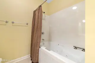 172 Clubhouse Road Apt 1, Sunset Beach, NC 28468 – photo 16: Primary bathroom