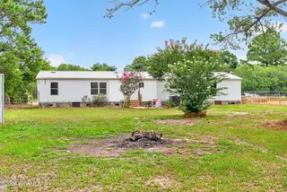 1199 Zack Street SE, Bolivia, NC 28422 — 4-bedroom manufactured home in Sandy Branch Retreat, Bolivia, NC, photo 3 of 44