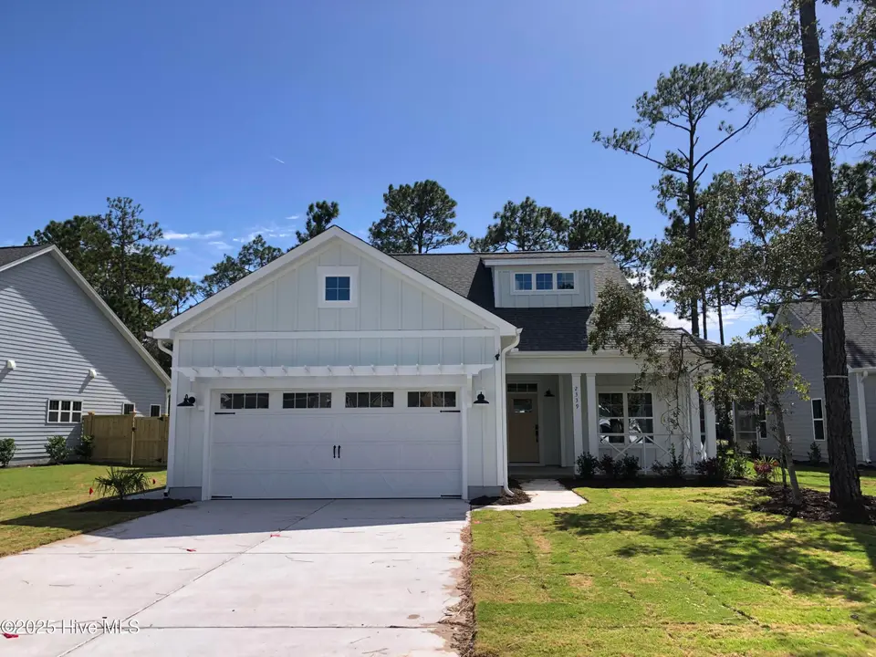2339 Crescent Bay Drive, Southport, NC 28461 – photo 1 of 27: Front of Home