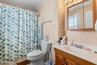 166 NW 7th Street, Oak Island, NC 28465 – photo 18: Master bathroom