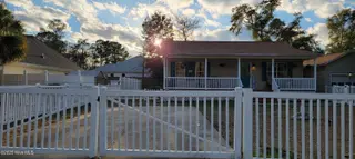 1074 Wilson Avenue SW, Calabash, NC 28467 — 3-bedroom home in Calabash Acres, Calabash, NC, photo 1 of 44: Front view