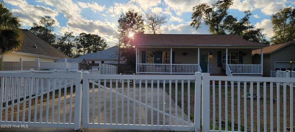 1074 Wilson Avenue SW, Calabash, NC 28467 — 3-bedroom home in Calabash Acres, Calabash, NC, photo 1 of 44: Front view