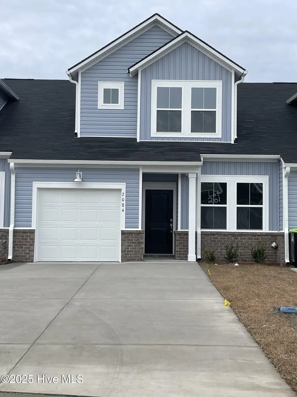 2084 NE Wild Indigo Circle NW 201, Calabash, NC 28467 – photo 1 of 17: Front Elevation