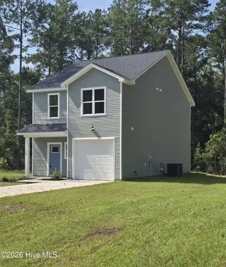 104 Palm Circle, Havelock, NC 28532 – photo 2: 8.25.26 Updated Side Pic