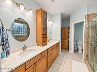301 Wisteria Way, Caswell Beach, NC 28465 – photo 21: Primary Bath