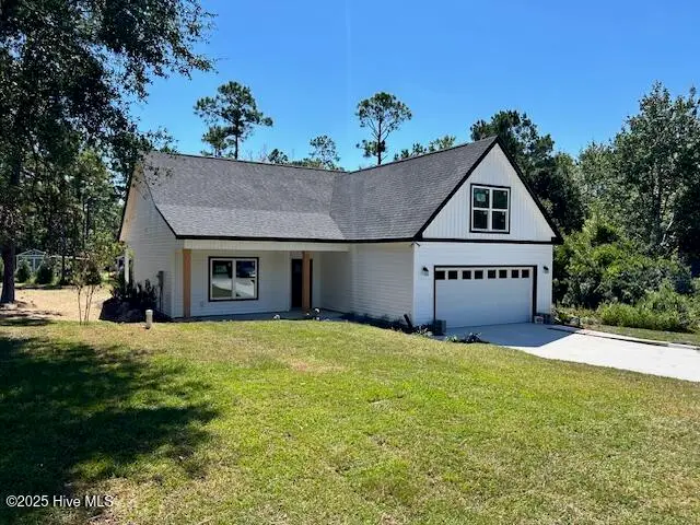 1996 E Boiling Spring Road, Southport, NC 28461 – photo 1 of 42: Front 2