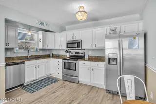 135 NE 36th Street, Oak Island, NC 28465 – photo 14: 08-Final 135 NE 36th St OKI-RJREM-7017
