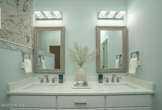 137 NE 3rd Street, Oak Island, NC 28465 – photo 13: Owners Retreat Bathroom