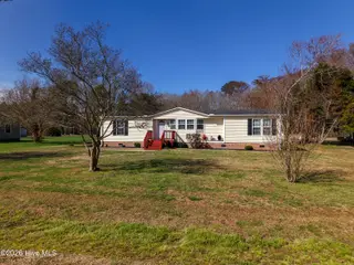 504 Timothy Drive, Elizabeth City, NC 27909 — 3-bedroom manufactured home in Timothy Acres, Elizabeth City, NC, photo 2 of 47: DJI_20260310111748_0242_Dedit