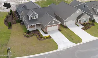 1064 Northbridge Court NW, Ocean Isle Beach, NC 28469 – photo 3: 1064 Northbridge Court NW Exterior 2 Tag