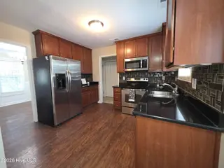 776 Jim Grant Avenue, Sneads Ferry, NC 28460 — 3-bedroom home in Grantwood, Sneads Ferry, NC, photo 4 of 20: JG kitchen last